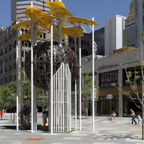 Aspen Grove Climber canopy detail with leaf-shaped panels providing shade in large-scale public art installation Denver