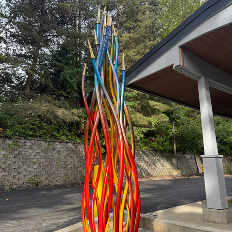 Unity Flame large-scale public art sculpture at Kirkland Fire Station 21 featuring twisting steel forms inspired by fire and community connection